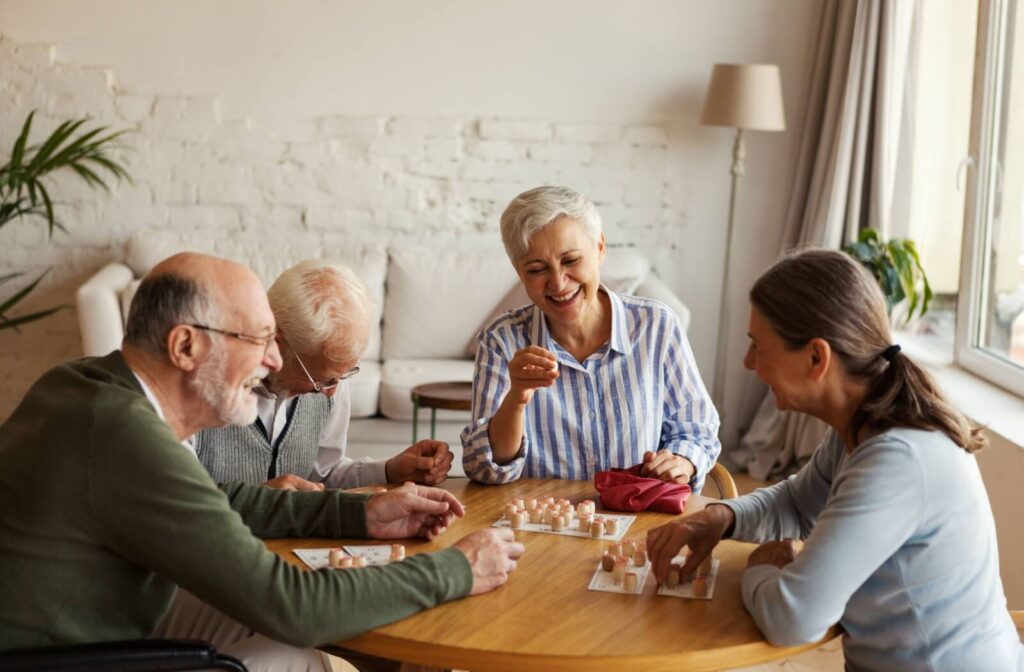 a group of seniors playing bingo in senior living community.